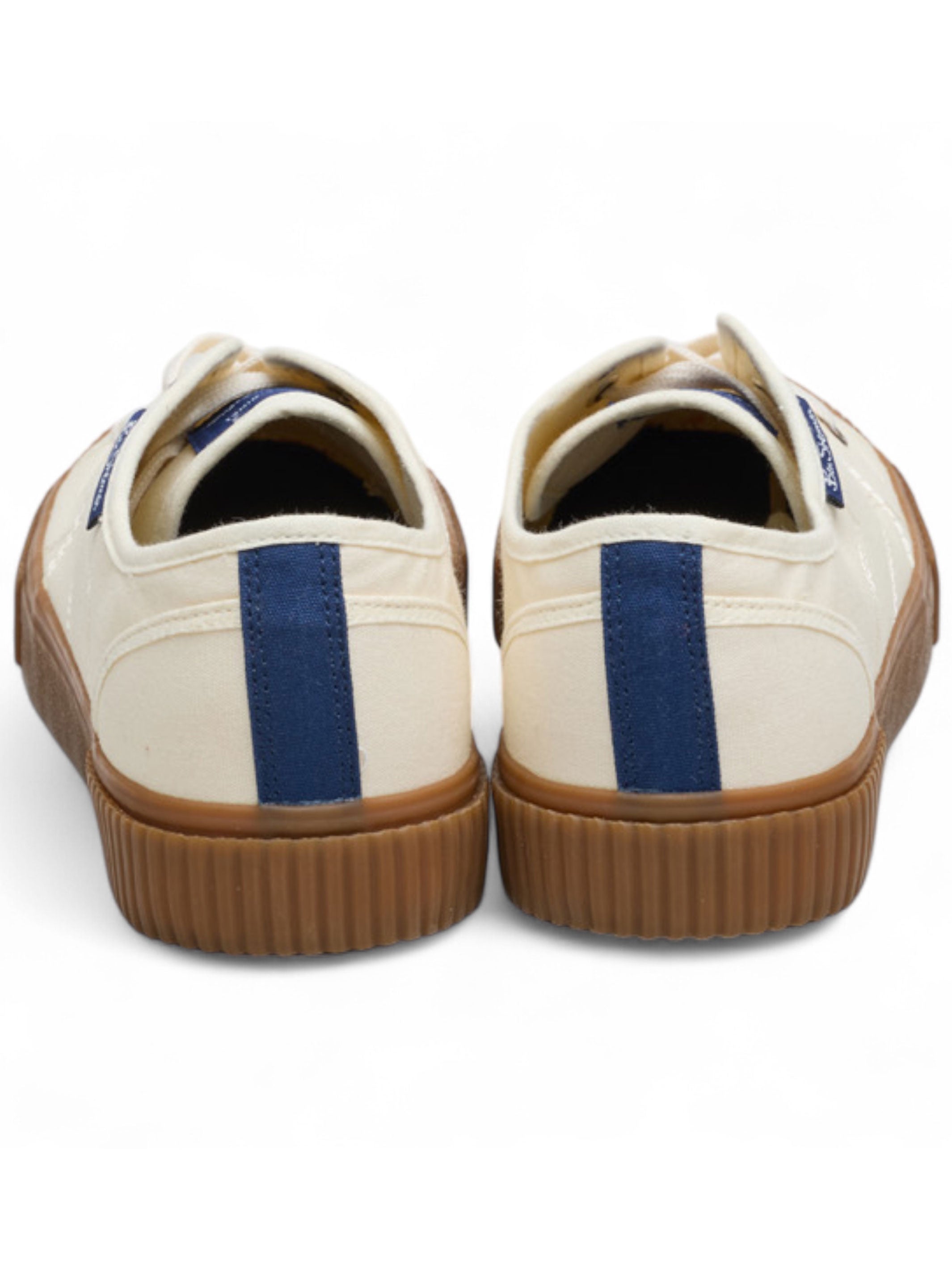Pair of cream sneakers with blue stripes and brown soles on a white background