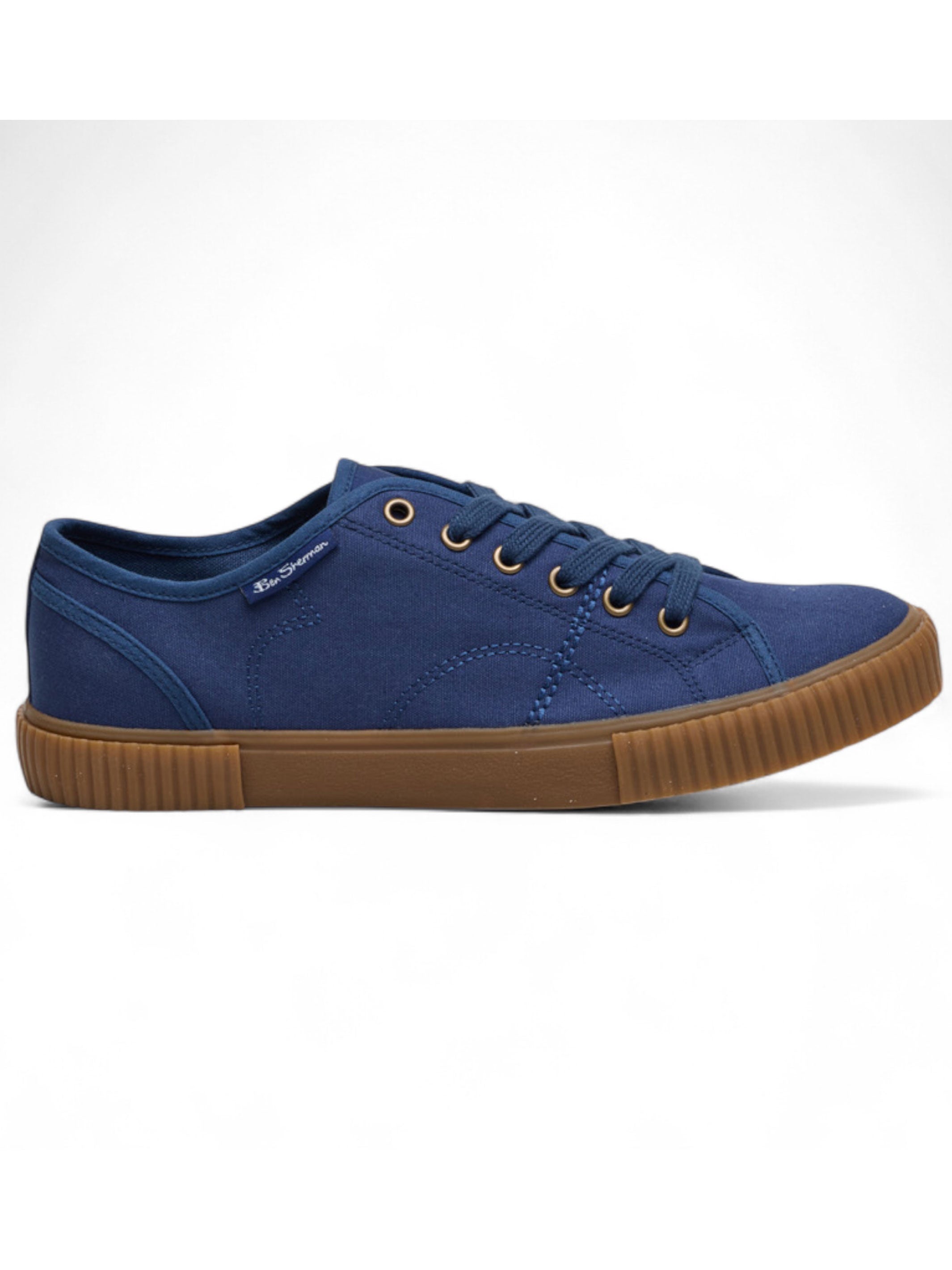 Blue sneaker with brown sole on a white background