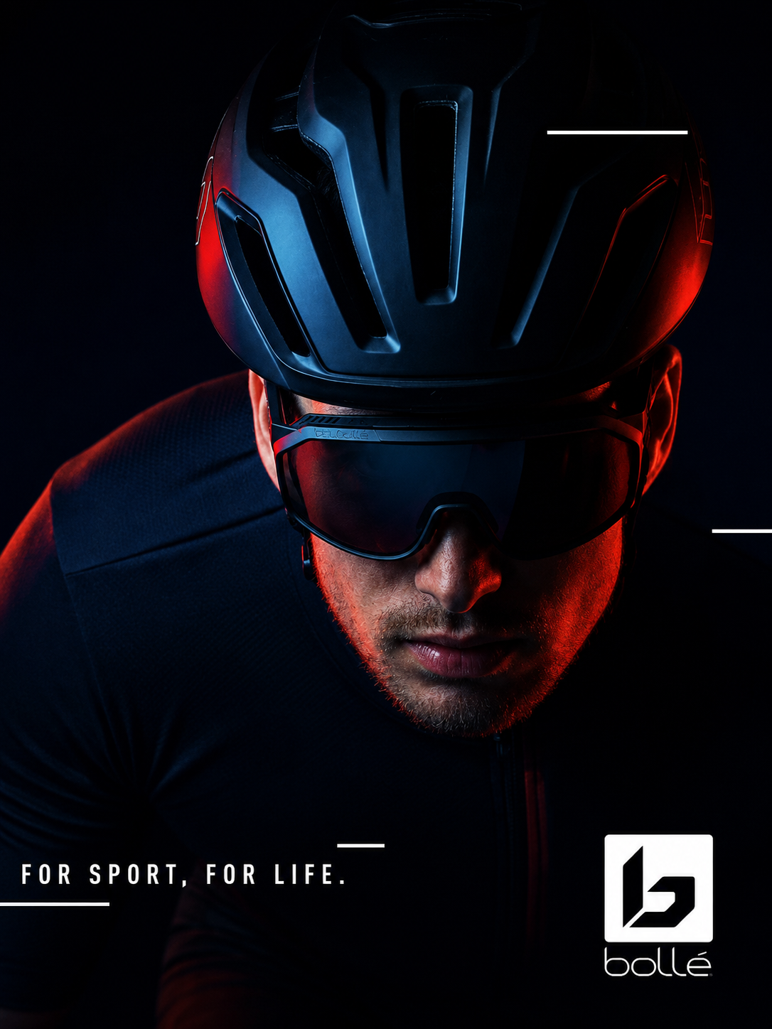 Person wearing a black helmet and goggles with 'bollé' branding on a dark background.