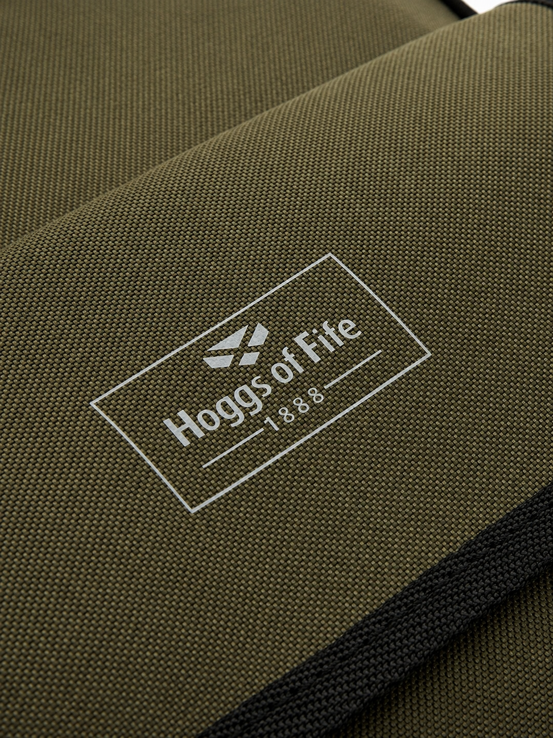 Close-up of a green bag with 'Hoggs of Fife' logo.