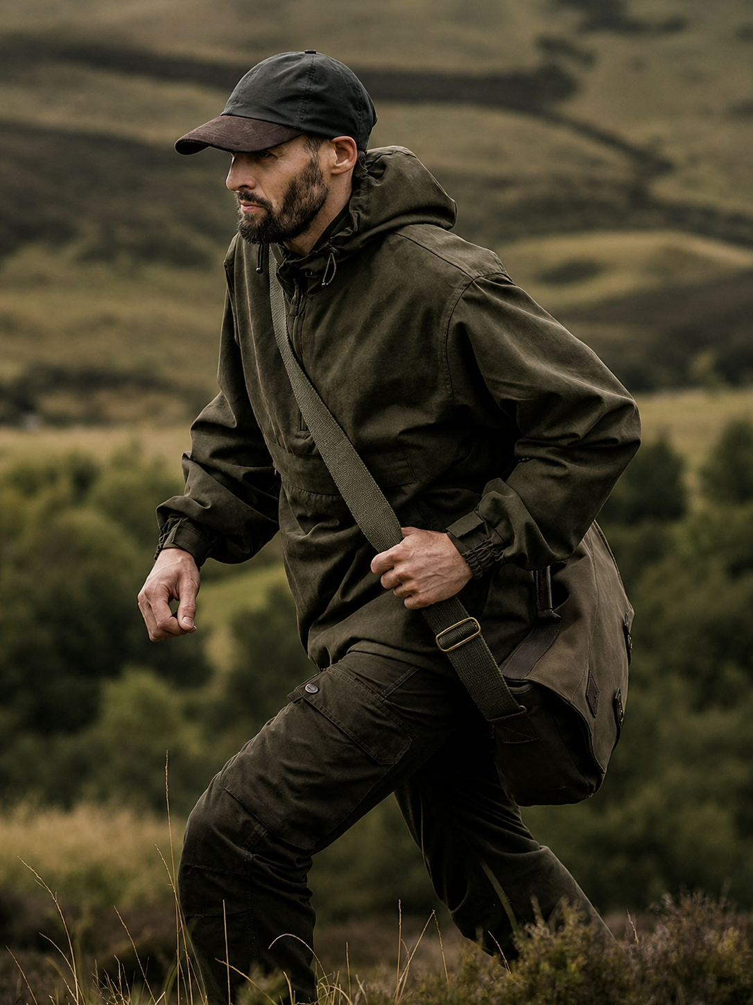 Man in outdoor gear walking through a natural landscape