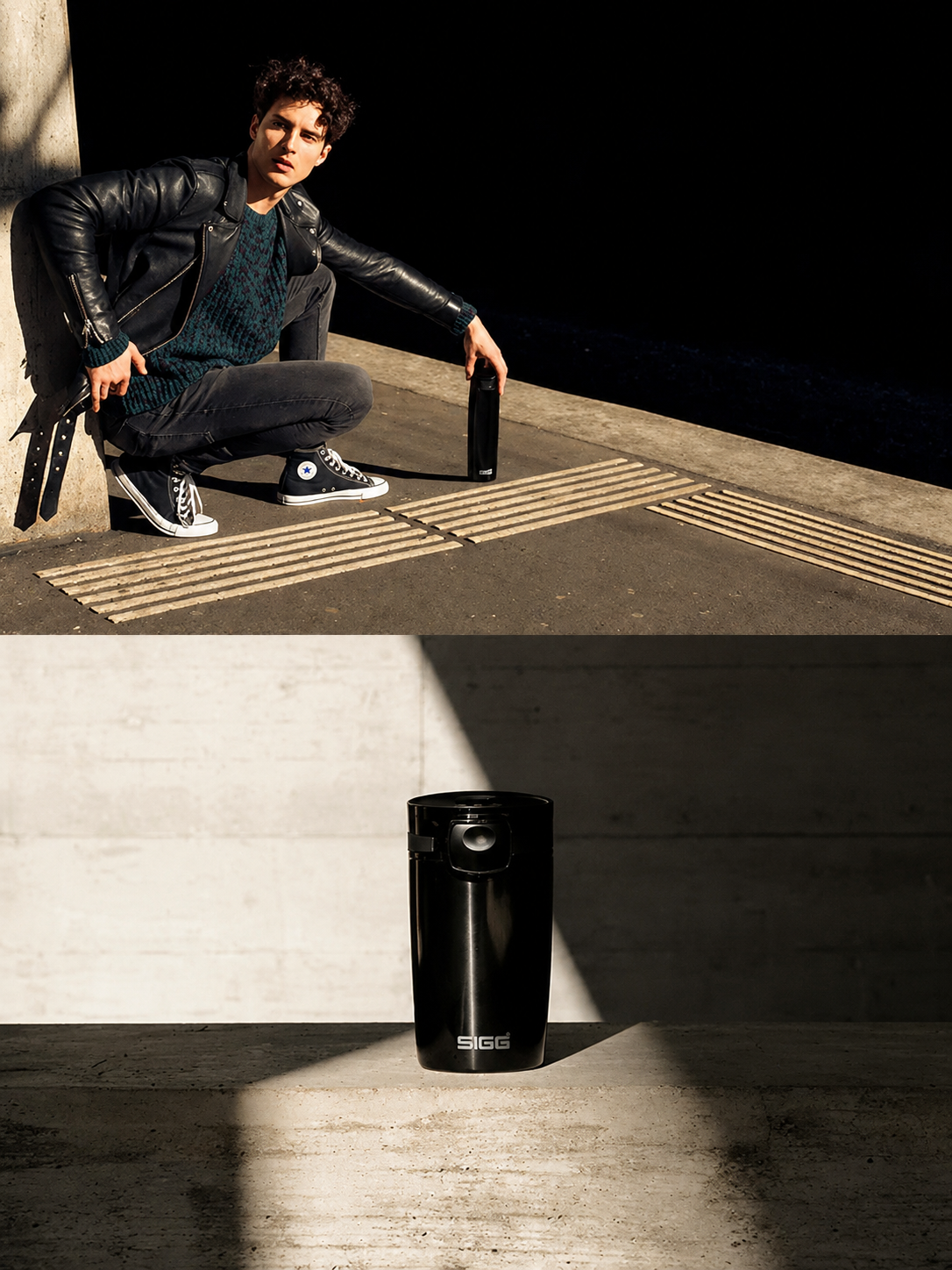 Person in black leather jacket holding a black bottle with a plain background